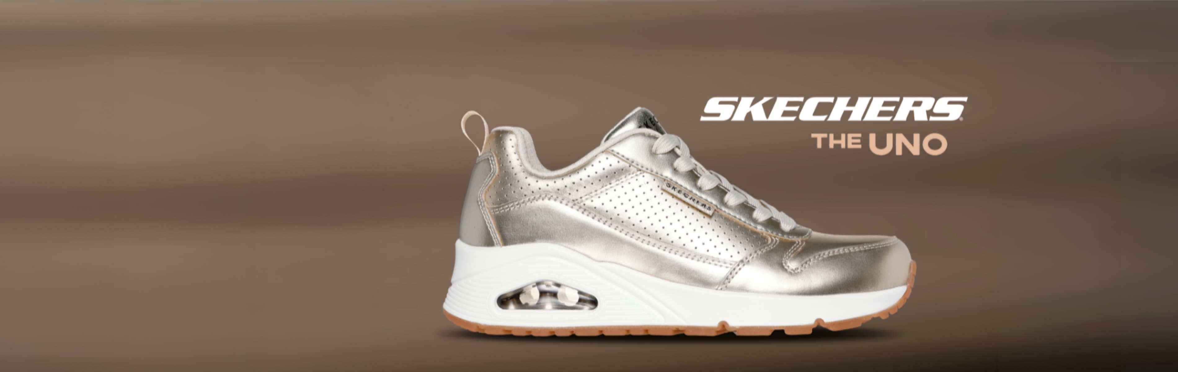 Skechers UNO Schuh champagner auf braunem Hintergrund