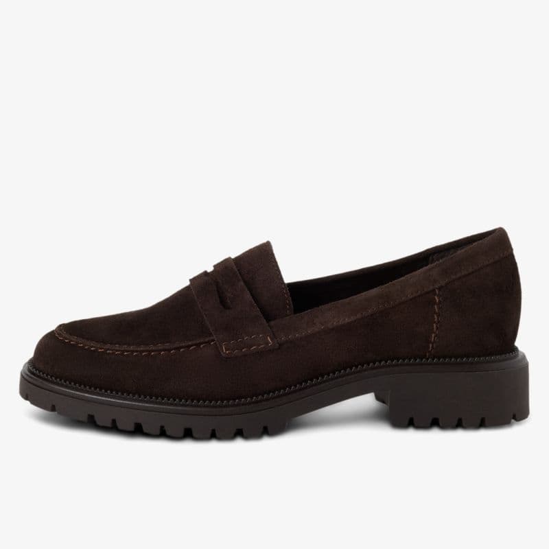 Dark brown suede loafer with a chunky, treaded sole, featuring detailed stitching and a penny strap across the upper.
