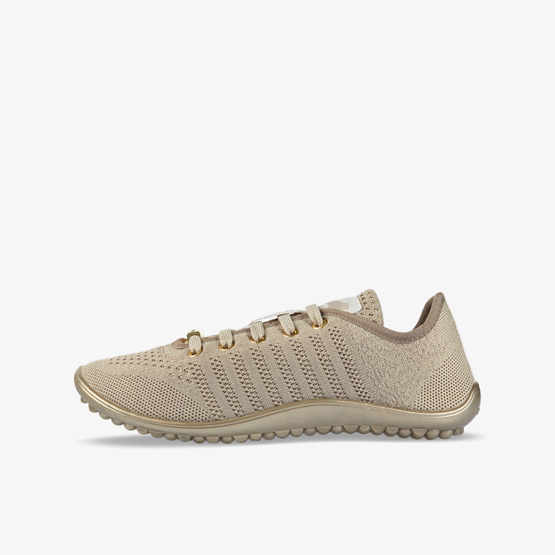 Beiger, leichter Sportschuh mit atmungsaktivem Material und flexibler Sohle für hohen Tragekomfort.